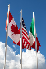 Flags of 3 USMCA countries made up of USA, Canada and Mexico