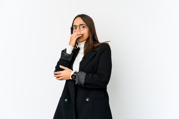 Young mixed race business woman isolated on white background scared and afraid.