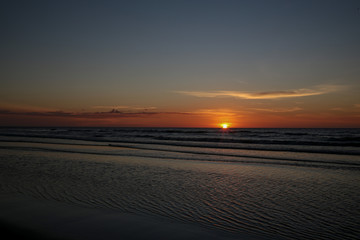 Naklejka premium sunset on the beach