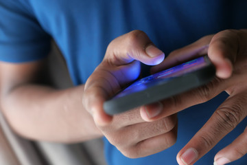 close up of person hand use smart phone