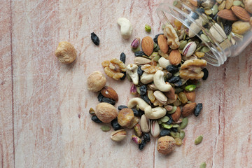 top view of mixed nut in a bowl on table 