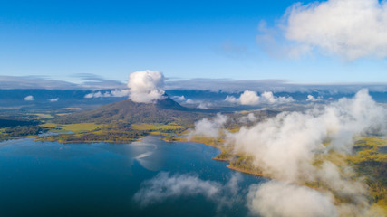 Beautiful volcanic lake scenery with blue sky and clouds