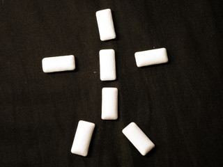 Plastic gum on a black background