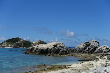 Okinawa Japan - Tokashiki Island Aharen Beach with rocks
