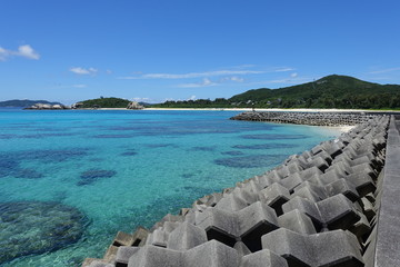 Fototapeta premium Okinawa Japan - Tokashiki Island Aharen protective wall marina