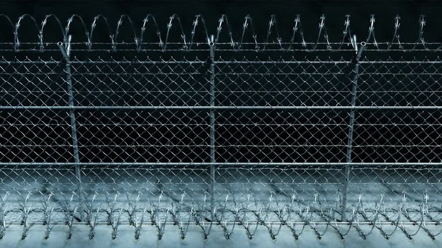 Endless footage showing the whole prison fence at night. Jail protection. 4k HD