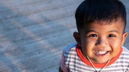 Cute little asian boy smiling