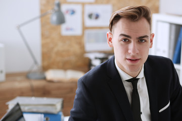 Handsome smiling businessman in suit portrait at workplace look in camera. White collar worker at workspace, exchange market, job offer, certified public accountant, internal Revenue officer concept