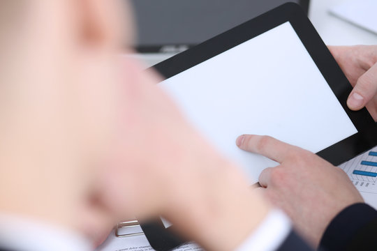 Businessmen reading financial review at tablet pc in office. Stock market trade and investment, modern data search, use wifi connection, white collar partner, e-commerce profit, inspiration concept