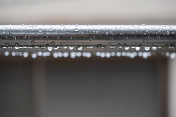 Drying Clothes on A Rainy Day, 雨粒がついた梅雨のイメージ　物干し竿