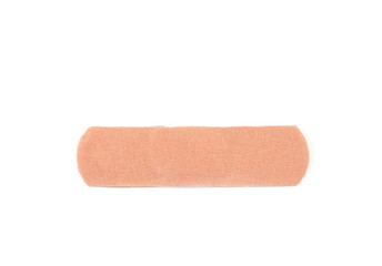 the plaster is isolated on a white background. Close-up.