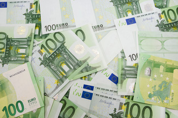 a lot of euro banknotes for background. 100 euro.