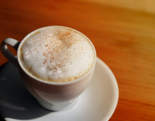 Photo of a delicious bright сup of coffee