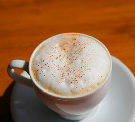 Photo of a delicious bright сup of coffee