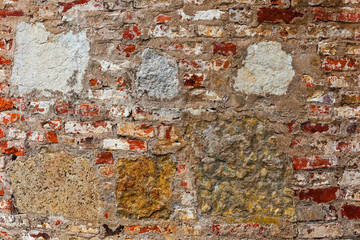 Old brick wall. Red brick wall. Brick wall repair.