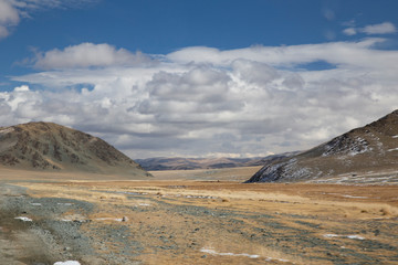 Fototapeta na wymiar Cloudy sky in the mountains of Mongolia