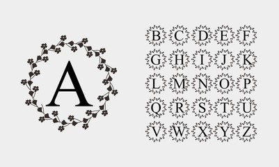 Black alphabet with line flowers theme Vector
