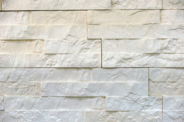 background of dark beige brick laid horizontally