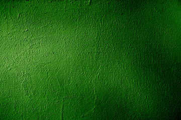 Fototapeta premium green bright background. Color gradient depending on the lighting. Light green uneven color. Crumpled sheet of green paper with natural light. Fragment of a sheet of green crumpled paper with highligh