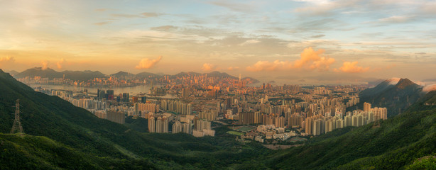 Panorama sunrise  view of Hong Kong city on the top view of  mountains peak © kamonrat