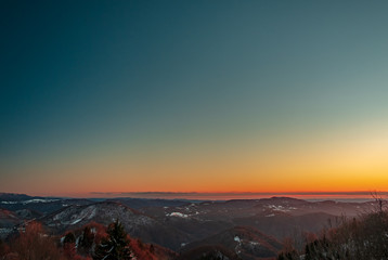 Fototapeta premium Winter sunset in the hills of Slovenia