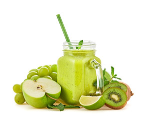 Apple, grape, kiwi fruit green smoothie in glass jar. Detox fresh healthy diet concept. Mint, apple...