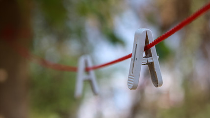 Clothes clips on wire