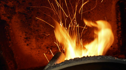 Fire burn pellets spruce sawdust delivery strew bio wooden pallets industrial boiler, sparks fly...