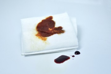 acriflavine in a bottle and cotton bud on a white background