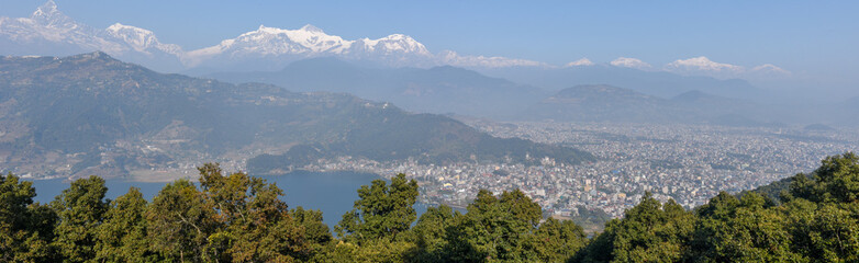 Fototapeta na wymiar Arial view on Pokhara city, lake Phewa and the Himalayan range on Nepal