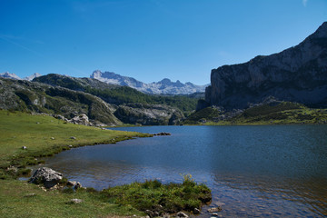 Fototapeta na wymiar Lakes in the high mountains on a summer day