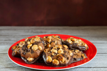 chocolate chip cookies on a red plate