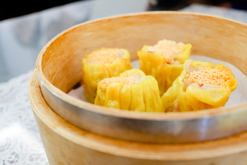 Delicious Chinese steamed shrimp dimsum in bamboo containers