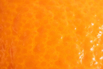 Peel of an orange close-up, bright macro photo. The concept of citrus, vitamin C. Abstract fruit background.
