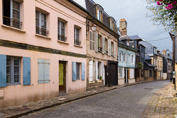 Fototapeta na wymiar Honfleur, France. Colorful old buildings on Bavole street