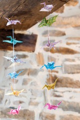 Detail of a decoration made with origami representing birds
