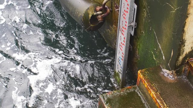 Water Level Indicator on Stormy Weather on Baltic Sea Shore