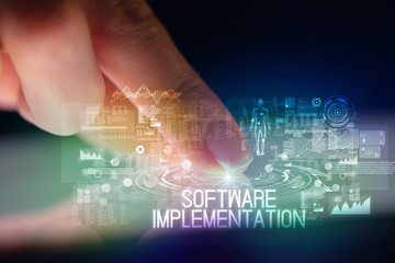 Finger touching tablet with web technology icons and SOFTWARE IMPLEMENTATION inscription