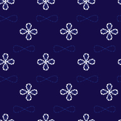 Vector blue shibori simple small four leaf clover pattern background. Suitable for textile, gift wrap and wallpaper.
