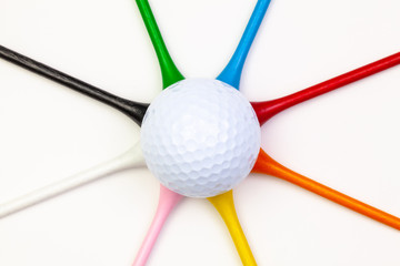 Golf set - golf ball and wooden tees.