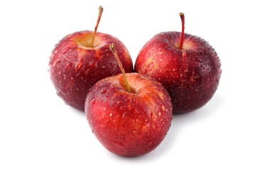 Three red little apples