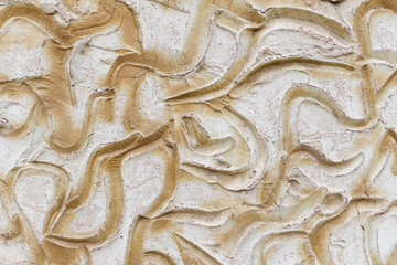 Plaster wall texture background or backdrop with ornaments