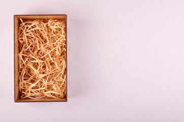 Box with hay or straw, packing template.
