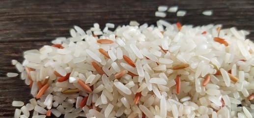rice with shrimpThe rice berry is clearly visible on the wooden table in my kitchen.