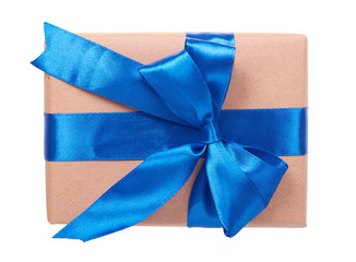 Gift box wrapped with brown paper. Isolated.