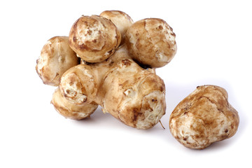 Jerusalem artichokes isolated on white