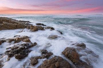 A beautiful seascape photographed just after sunset on the Marina beach in South Africa.