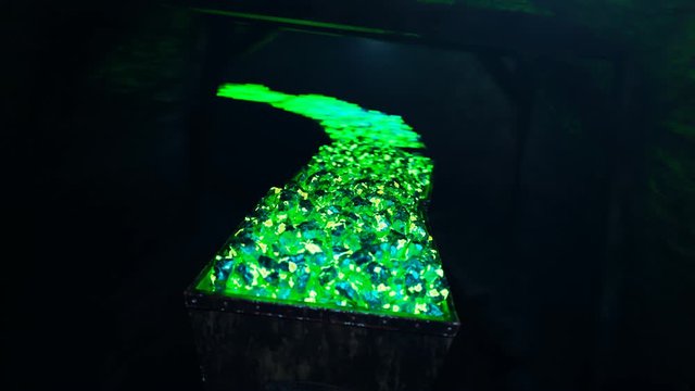 Multiple minecarts full of uranium ore gems are going through the tunnel. 4KHD