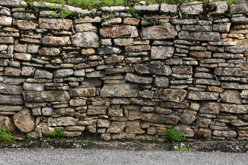 traditional stone wall on portuguese countryside