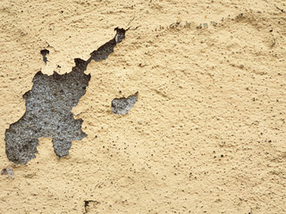 background texture design of an old colored wall with damage